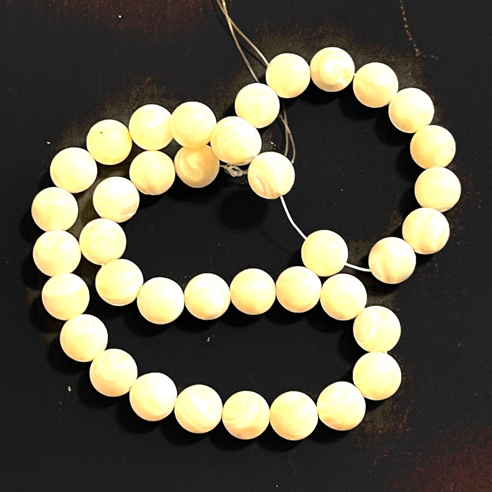 Strand of 10mm Cream Mother of Pearl Beads